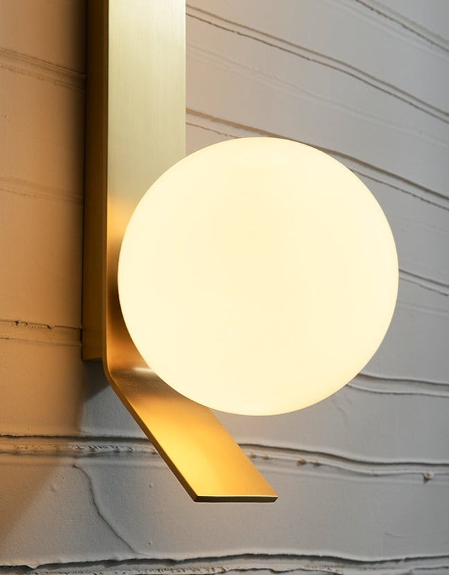 On the Edge Brass & Globe Wall Lamp